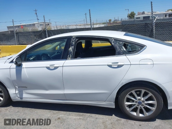 2017 Ford Fusion Hybrid SE with VIN 3FA6P0LU3HR326980, listed as a IAAI auction lot 42692591 with 141,122 mi miles and . Bid and sale history available at DreamBid. Image 14.