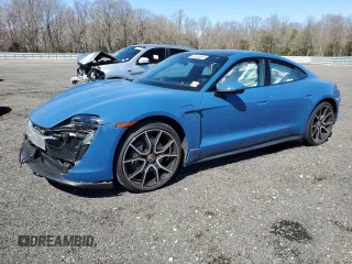 2023 Porsche Taycan z VIN WP0AA2Y13PSA17290, wystawiony jako Copart lot #50455685 z przebiegiem Nie podano mil oraz Szkody całkowita. Historia ofert i sprzedaży dostępna na DreamBid. Obrazek 1.