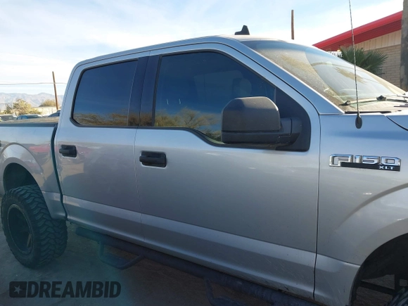 2019 Ford F-150 XL with VIN 1FTEW1E43KKE23264, listed as a IAAI auction lot 41395865 with 106,898 mi miles. Bid and sale history available at carsss.com. Image 13.