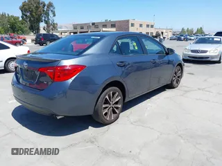 2017 Toyota Corolla L with VIN 5YFBURHE6HP575352, listed as a IAAI auction lot 42417810 with 248,626 mi miles and . Bid and sale history available at DreamBid. Image 4.