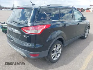 2014 Ford Escape Titanium with VIN 1FMCU9JX2EUB66579, listed as a IAAI auction lot 42171374 with 131,485 mi miles. Bid and sale history available at carsss.com. Image 4.