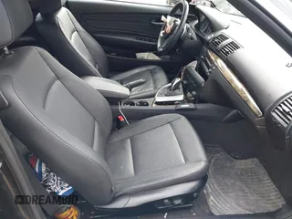 2011 BMW 1 Series 135i с VIN WBAUN7C50BVM25336, выставлен на аукционе IAAI как лот 41720402 с пробегом Не указан миль и . История ставок и продаж доступна на DreamBid. Изображение 5.
