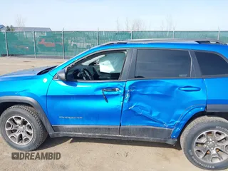 2021 Jeep Cherokee Trailhawk with VIN 1C4PJMBX4MD222987, listed as a IAAI auction lot 41771808 with 52,533 mi miles and . Bid and sale history available at DreamBid. Image 6.