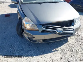 2010 Kia Sedona LX with VIN KNDMG4C34A6357531, listed as a IAAI auction lot 40493225 with 174,529 mi miles. Bid and sale history available at carsss.com. Image 12.
