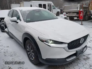 2024 Mazda CX-30 2.5 S with VIN 3MVDMBAMXRM667430, listed as a IAAI auction lot 41505781 with 874 mi miles. Bid and sale history available at carsss.com. Image 1.