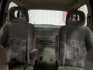 2000 Pontiac Montana z VIN 1GMDU03EXYD365251, wystawiony jako Copart lot #79131854 z przebiegiem 182 527 mil mil oraz Nie do naprawy • Non repairable. Historia ofert i sprzedaży dostępna na DreamBid. Obrazek 10.