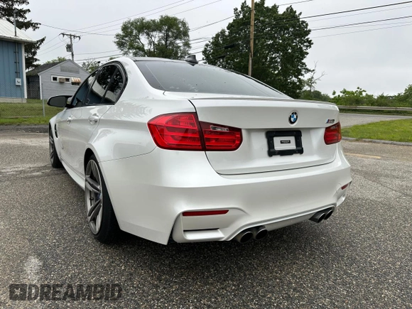 2015 BMW M3 with VIN WBS3C9C57FP803591, listed as a Copart auction lot 62894955 with 183,389 mi miles and Clean title. Bid and sale history available at DreamBid. Image 3.
