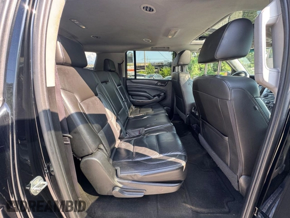 2016 Chevrolet Suburban LT with VIN 1GNSKHKC0GR14614, listed as a Copart auction lot 65295535 with 215,675 mi miles and Clean title. Bid and sale history available at DreamBid. Image 6.