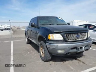 2003 Ford F-150 XLT with VIN 1FTRW08L83KA14760, listed as a IAAI auction lot 41820943 with 215,130 mi miles. Bid and sale history available at carsss.com. Image 18.