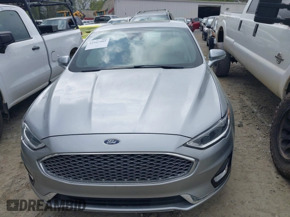 2020 Ford Fusion Titanium с VIN 3FA6P0K91LR128016, выставлен на аукционе IAAI как лот 41947905 с пробегом 79 622 миль миль и . История ставок и продаж доступна на DreamBid. Изображение 12.