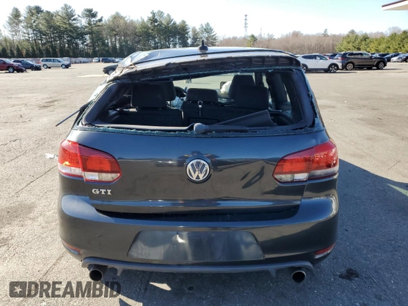 2012 Volkswagen GTI w/Conv & Sunroof with VIN WVWEV7AJ4CW125785, listed as a Copart auction lot 49780335 with 125,837 mi miles and Salvage title. Bid and sale history available at DreamBid. Image 6.