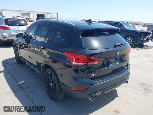 2021 BMW X1 sDrive28i with VIN WBXJG7C07M3M65841, listed as a IAAI auction lot 41877032 with 79,817 mi miles and . Bid and sale history available at DreamBid. Image 3.