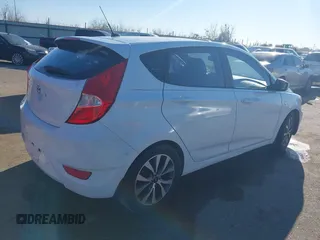 2015 Hyundai Accent Sport with VIN KMHCU5AE9FU205662, listed as a IAAI auction lot 41384496 with 80,133 mi miles. Bid and sale history available at carsss.com. Image 4.