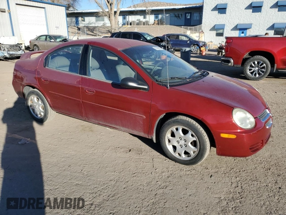 2004 Dodge Neon SXT with VIN 1B3ES56C34D542451, listed as a Copart auction lot 87085194 with 63,105 mi miles and Salvage Title. Bid and sale history available at carsss.com. Image 4.