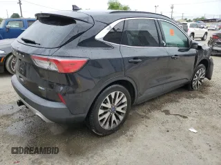 2020 Ford Escape Titanium with VIN 1FMCU9J97LUA59056, listed as a Copart auction lot 58445885 with Not provided miles and Salvage title. Bid and sale history available at DreamBid. Image 3.