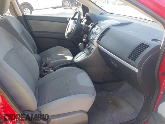 2012 Nissan Sentra S z VIN 3N1AB6AP8CL705426, wystawiony jako IAAI lot #42598817 z przebiegiem 139 781 mil mil oraz . Historia ofert i sprzedaży dostępna na DreamBid. Obrazek 5.