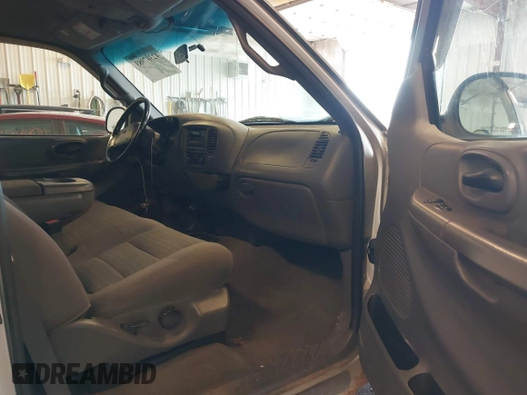 2001 Ford F-150 XL with VIN 2FTRF18W31CB06246, listed as a IAAI auction lot 42307983 with 148,440 mi miles and . Bid and sale history available at DreamBid. Image 5.