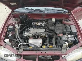 1997 Mitsubishi Mirage DE z VIN JA3AY26AXVU007285, wystawiony jako Copart lot #71958454 z przebiegiem 156 415 mil mil oraz Szkoda całkowita • Salvage title. Historia ofert i sprzedaży dostępna na DreamBid. Obrazek 11.