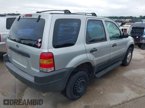 2003 Ford Escape XLS Popular with VIN 1FMYU02123KA32790, listed as a IAAI auction lot 42122524 with 244,560 mi miles and . Bid and sale history available at DreamBid. Image 4.
