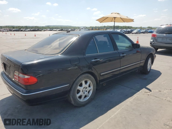 2001 Mercedes-Benz E-Class with VIN WDBJF65J01B225871, listed as a Copart auction lot 66136994 with 2,139,454 mi miles and Clean Title. Bid and sale history available at carsss.com. Image 3.