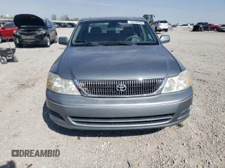 2001 Toyota Avalon XL z VIN 4T1BF28B51U184110, wystawiony jako Copart lot #52398285 z przebiegiem 127 179 mil mil oraz Szkoda całkowita • Salvage title. Historia ofert i sprzedaży dostępna na DreamBid. Obrazek 5.
