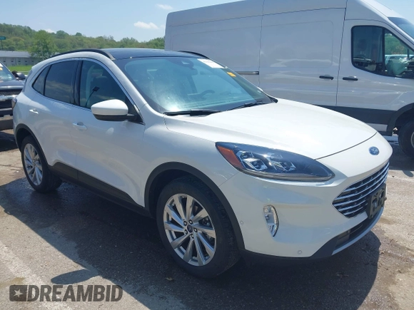 2021 Ford Escape Titanium with VIN 1FMCU9J91MUA29407, listed as a IAAI auction lot 42120442 with 19,314 mi miles and . Bid and sale history available at DreamBid. Image 1.