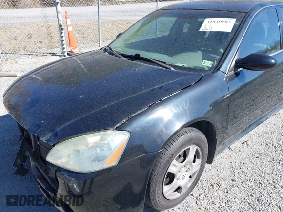 2003 Nissan Altima S with VIN 1N4AL11D33C320084, listed as a IAAI auction lot 41849903 with 212,137 mi miles. Bid and sale history available at carsss.com. Image 17.