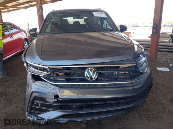 2024 Volkswagen Tiguan SE R-Line Black with VIN 3VVCB7AX4RM046261, listed as a IAAI auction lot 42327569 with 15,428 mi miles and . Bid and sale history available at DreamBid. Image 6.