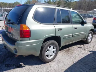 2003 GMC Envoy SLT with VIN 1GKDS13S432373988, listed as a IAAI auction lot 41840744 with 221,306 mi miles. Bid and sale history available at carsss.com. Image 4.