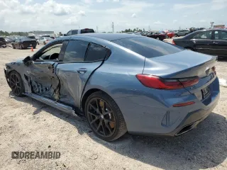 2022 BMW 8 Series M850i with VIN WBAGV8C05NCH25299, listed as a Copart auction lot 57378503 with 0 mi miles. Bid and sale history available at carsss.com. Image 2.