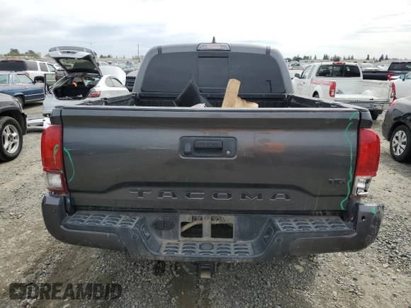 2019 Toyota Tacoma SR5 with VIN 3TMAZ5CN9KM090828, listed as a Copart auction lot 49498715 with 118,551 mi miles and Salvage title. Bid and sale history available at DreamBid. Image 6.