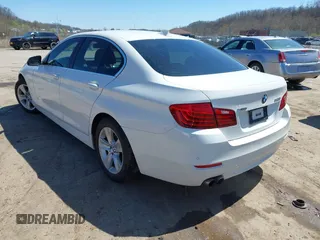 2015 BMW 5 Series 528i xDrive with VIN WBA5A7C54FG143565, listed as a IAAI auction lot 41948957 with 107,255 mi miles and . Bid and sale history available at carsss.com. Image 3.