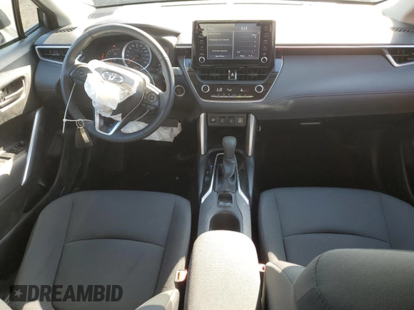 2022 Toyota Corolla Cross LE with VIN 7MUCAABGXNV025847, listed as a Copart auction lot 49153095 with 37,789 mi miles and Salvage title. Bid and sale history available at DreamBid. Image 8.