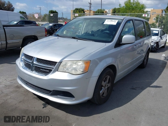 2012 Dodge Grand Caravan SXT with VIN 2C4RDGCG7CR204835, listed as a IAAI auction lot 41948688 with 125,466 mi miles and . Bid and sale history available at DreamBid. Image 2.