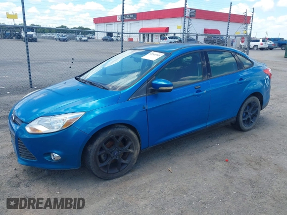 2013 Ford Focus SE z VIN 1FADP3F29DL300041, wystawiony jako IAAI lot #42361903 z przebiegiem 160 537 mil mil oraz . Historia ofert i sprzedaży dostępna na DreamBid. Obrazek 2.