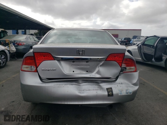 2010 Honda Civic z VIN 19XFA1E39AE028789, wystawiony jako Copart lot #71501844 z przebiegiem 136 429 mil mil oraz Szkoda całkowita • Salvage title. Historia ofert i sprzedaży dostępna na DreamBid. Obrazek 6.