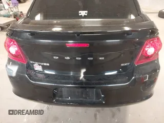 2014 Dodge Avenger SXT z VIN 1C3CDZCB3EN156146, wystawiony jako IAAI lot #42000054 z przebiegiem 149 166 mil mil oraz . Historia ofert i sprzedaży dostępna na DreamBid. Obrazek 16.