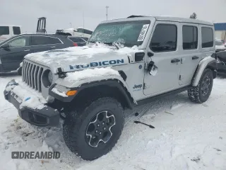 2022 Jeep Wrangler Unlimited Rubicon with VIN 1C4JJXR63NW264609, listed as a Copart auction lot 88148715 with 33,308 mi miles and Salvage title. Bid and sale history available at DreamBid. Image 1.