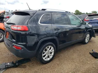 2014 Jeep Cherokee Latitude with VIN 1C4PJLCSXEW320764, listed as a Copart auction lot 83899244 with 140,904 mi miles and Salvage Title. Bid and sale history available at carsss.com. Image 3.