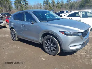 2018 Mazda CX-5 Touring with VIN JM3KFBCM4J0470509, listed as a IAAI auction lot 41780755 with 90,130 mi miles. Bid and sale history available at carsss.com. Image 1.