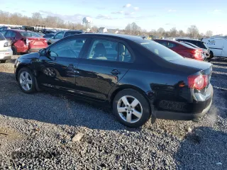 2009 Volkswagen Jetta z VIN 3VWHZ71K59M088780, wystawiony jako Copart lot #87115414 z przebiegiem 88 197 mil mil oraz Czysty tytuł • Clean title. Historia ofert i sprzedaży dostępna na DreamBid. Obrazek 2.