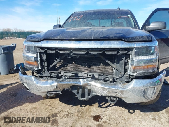 2016 Chevrolet Silverado 1500 LT with VIN 1GCVKREC3GZ121358, listed as a IAAI auction lot 41693996 with 103,811 mi miles and . Bid and sale history available at DreamBid. Image 6.