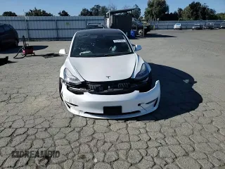 2019 Tesla Model 3 Mid Range z VIN 5YJ3E1EA7KF326727, wystawiony jako Copart lot #56243505 z przebiegiem 49 009 mil mil oraz Szkoda całkowita • Salvage title. Historia ofert i sprzedaży dostępna na DreamBid. Obrazek 14.