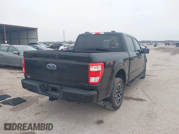 2023 Ford F-150 XL with VIN 1FTEW1C55PKD01184, listed as a IAAI auction lot 41700658 with 18,804 mi miles. Bid and sale history available at carsss.com. Image 4.