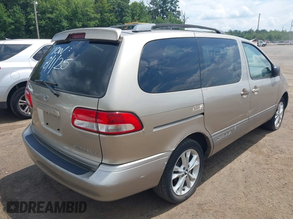 2001 Toyota Sienna LE with VIN 4T3ZF13C01U325889, listed as a IAAI auction lot 42795570 with 211,585 mi miles and . Bid and sale history available at DreamBid. Image 4.