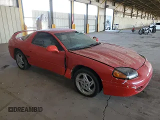 1999 Mitsubishi 3000GT z VIN JA3AM44H3XY001394, wystawiony jako Copart lot #75942814 z przebiegiem 75 146 mil mil oraz Tytuł czysty. Historia ofert i sprzedaży dostępna na DreamBid. Obrazek 4.