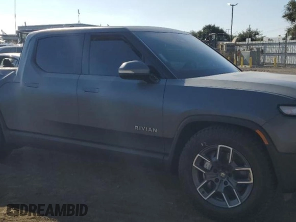 2024 Rivian R1T Adventure with VIN 7FCTGBAA1RN032543, listed as a Copart auction lot 69800484 with Not Provided miles and Salvage Title. Bid and sale history available at carsss.com. Image 4.
