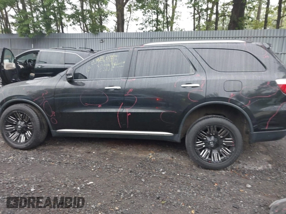 2013 Dodge Durango Crew with VIN 1C4RDJDG8DC675527, listed as a IAAI auction lot 42452197 with 184,981 mi miles and . Bid and sale history available at DreamBid. Image 14.