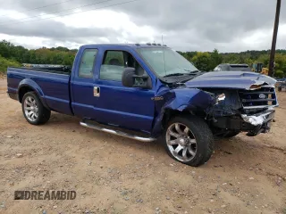 1999 Ford F-250 XL with VIN 1FTNX20L8XEB15501, listed as a Copart auction lot 70181124 with 125,476 mi miles and Salvage title. Bid and sale history available at DreamBid. Image 4.