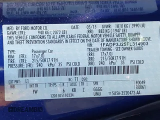 2015 Ford Focus Titanium with VIN 1FADP3J25FL314903, listed as a IAAI auction lot 42053132 with 125,418 mi miles and . Bid and sale history available at carsss.com. Image 9.